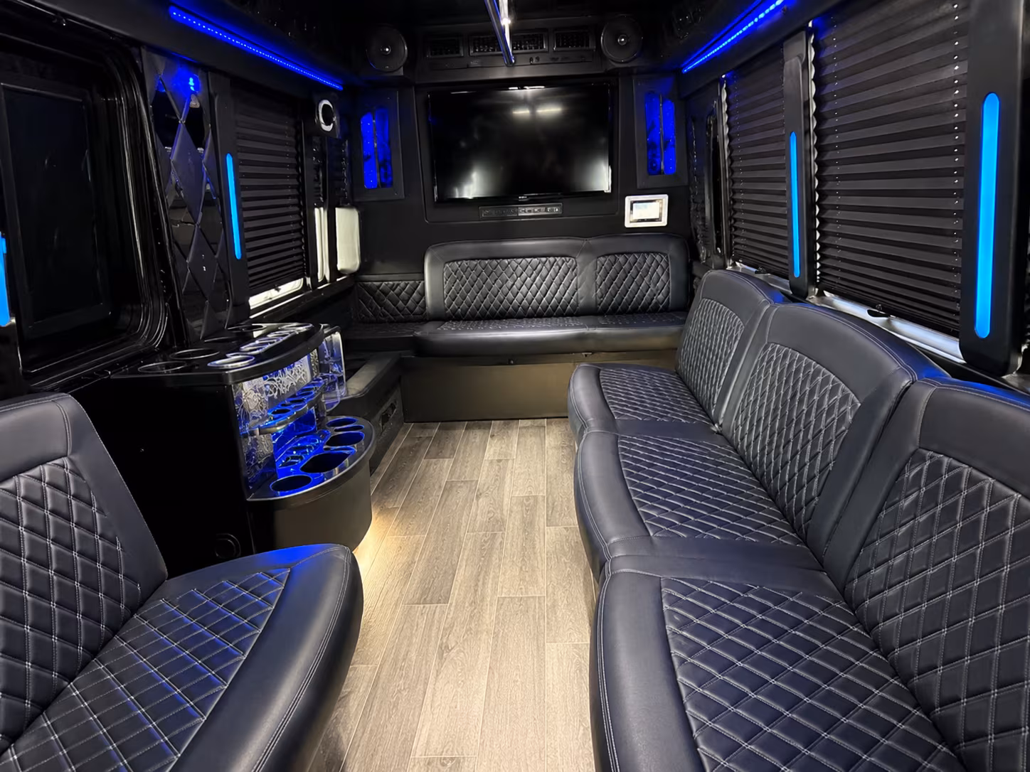 Group beside a Mercedes Sprinter limo in Cincinnati